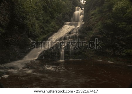 Dingmans Falls cascade down the mountain after a storm