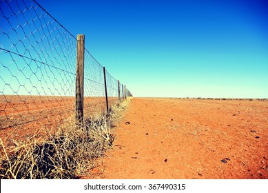 Dingo Fence In The Australian Outback