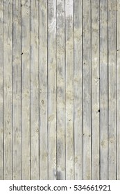 Dingy Grey Barn Wooden Wall Planking Vertical Texture. Old Solid Wood Slats Rustic Shabby Gray Background. Hardwood Dark Weathered Vintage Surface. Grungy Faded Timber Wood Rough Exterior Structure.