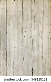 Dingy Grey Barn Wooden Wall Planking Vertical Texture. Old Solid Wood Slats Rustic Shabby Gray Background. Hardwood Dark Weathered Vintage Surface. Grungy Faded Timber Wood Rough Exterior Structure.