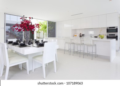 Dining area and kitchen in stylish Australian home - Powered by Shutterstock