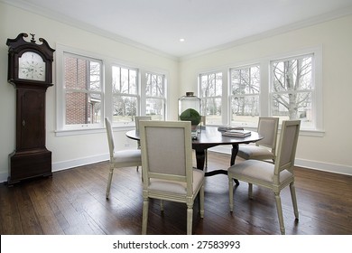 Dining room with large clock