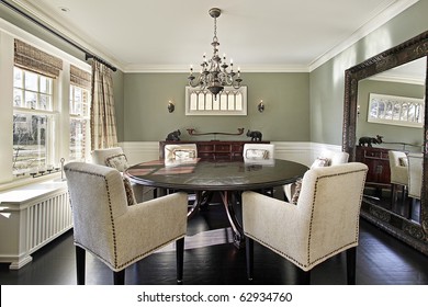 Dining Room In Luxury Home With Olive Walls