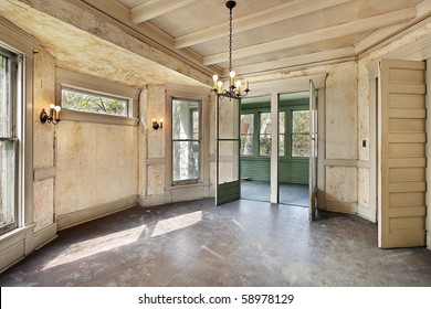 Dining room with peeling paint in old abandoned home - Powered by Shutterstock