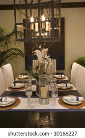 Dining room and table with modern decor.