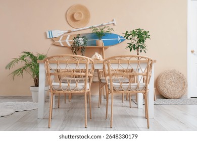 Dining table and surfboard with paddle