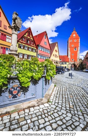 Dinkelsbuhl, Germany. Beautiful small town with traditional colorful houses on Romantic Road route, famous scenics of Bavaria.