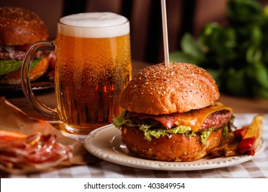 dinner with burger and beer - Powered by Shutterstock