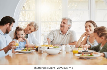 Dinner, children and happy in big family home with eating, talk and laugh with mom, dad and grandparents. Men, women and kid for food, lunch or brunch for memory, conversation or smile in dining room - Powered by Shutterstock