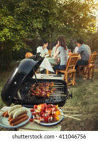 Dinner Party, Barbecue And Roast Pork At Night