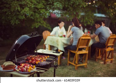 Dinner Party, Barbecue And Roast Pork At Night