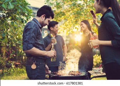 Dinner Party, Barbecue And Roast Pork At Night
