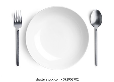 Dinner Place Setting. A White Plate With Silver Fork And Spoon Isolated On White Background.