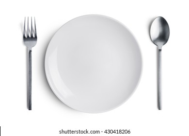 Dinner Place Setting. A White Plate With Silver Fork And Spoon Isolated On White Background.