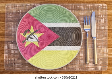 Dinner Plate With The Flag Of Mozambique On It For Your International Food And Drink Concepts.