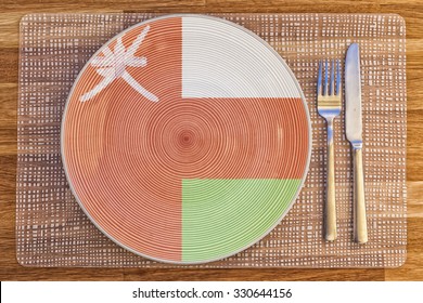 Dinner Plate With The Flag Of Oman On It For Your International Food And Drink Concepts.