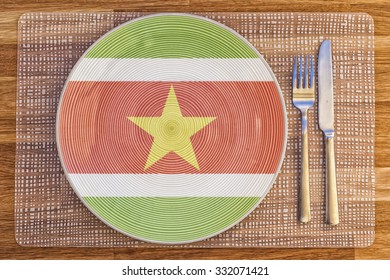 Dinner Plate With The Flag Of Suriname On It For Your International Food And Drink Concepts.