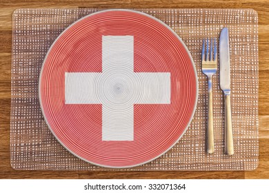 Dinner Plate With The Flag Of Switzerland On It For Your International Food And Drink Concepts.