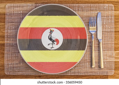 Dinner Plate With The Flag Of Uganda On It For Your International Food And Drink Concepts.