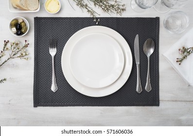 Dinner plate setting top view - Shutterstock ID 571606036