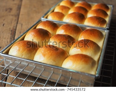 dinner roll bread on wood