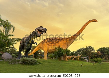 Dinosaur statue at Phu-Wiang forest dinosaur public park in Phu-Wiang on sunset sky background, Khonkaen of Thailand