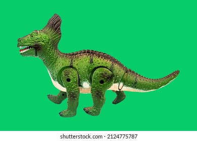 Dinosaur Toy On Green Screen Background. Take A Photo And Cut The Background And Overlay With Green Screen And There Are Also Clipping Path.