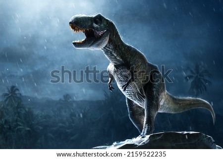 Dinosaur tyrannosaurus rex on top mountain