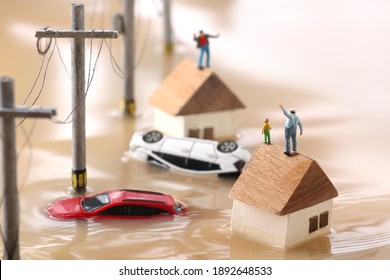 Diorama landscape of houses flooded by floods and people waiting for rescue - Shutterstock ID 1892648533
