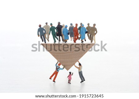 A diorama model that represents the future of young people who support the elderly 