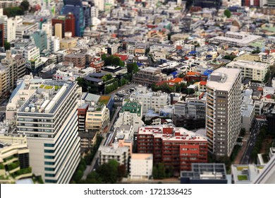 A diorama style photo of a residential area in central Tokyo with large and small condominiums - Shutterstock ID 1721336425