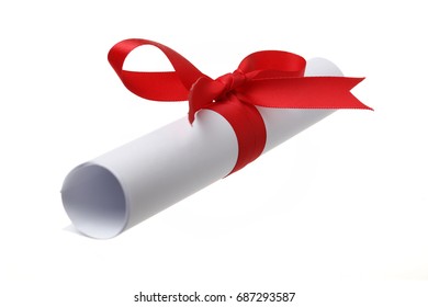 Diploma, close up of paper scroll with red ribbon isolated on white background - Shutterstock ID 687293587