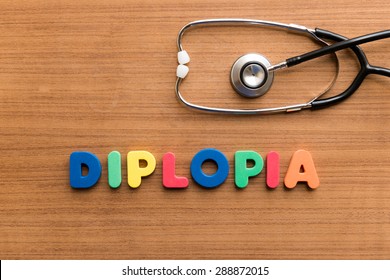 Diplopia  Colorful Medical Word And Stethoscope On The Wooden Background