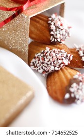 Dipped peppermint Madeleine cookies in glitter box