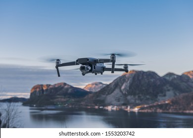 Dirdal, Rogaland / Norway - November 06 2019: Drone In Mid Air Surrounded By Beautiful Norwegian Mountain Range And Fjord.