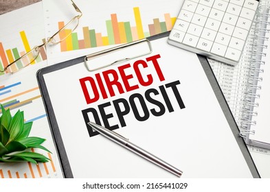 Direct Deposit Text On White Paper With Charts And Pen