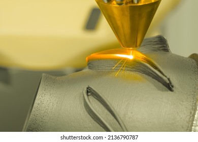 Direct Metal Deposition - Advanced Additive Laser Melting And Powder Spray Manufacturing Technology For Repair, Rebuild Metal Workpieces - Close Up. Metalworking, Robotic, Industrial Concept