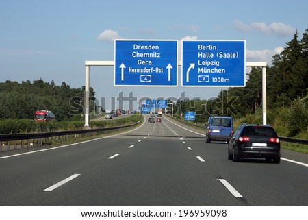 Similar – Motorway signpost to Berlin