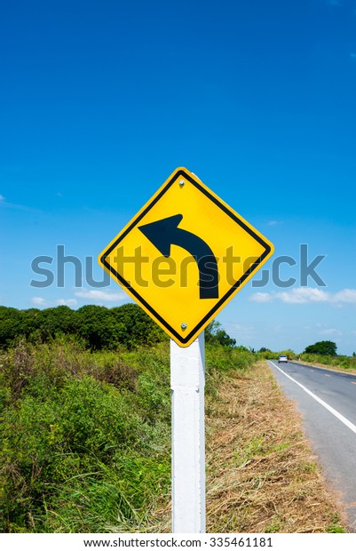 Direction sign- left turn\
warning.