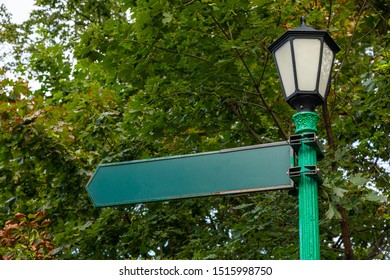 Direction sign on lightpost, classic style