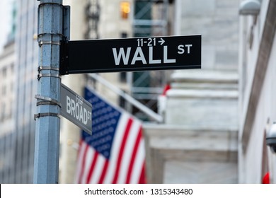 Directional Sign Board Of Wall Street In New York City