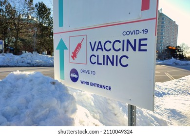 Directional Sign To Show Direction To The Entrance Of Covid-19 Vaccine Clinic