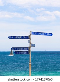 Directional signpost at St. Leonard's Beach, Bellarine Peninsula on Port Phillip Bay. "Portsea, Sorrento, Arthur's Seat, Point Lonsdale", Victoria, Australia.