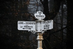 Directional Signs In The Perseigne Forest. Generally Made Of Cast Iron, Also Called Coachman Plates, At The Height Of A Coachman Who Drove The Horses. January 21, 2024. Department Of Sarthe, France.