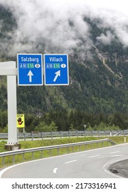 directions on the Austrian motorway to reach the city of Salzburg or Villach using the white big arrows