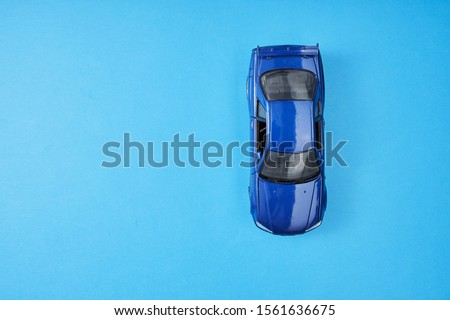 directly above of blue toy car on the blue background