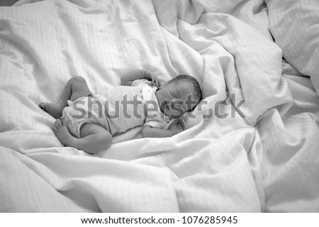 Similar – Baby girl with pompom hat sleeping