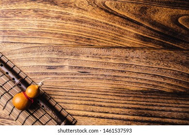 Directly Above View Close Up Chinese Style Wooden Table On Bamboo Slips And Gourds