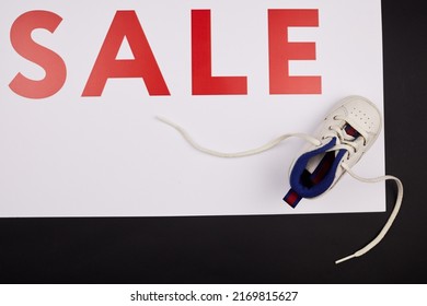 Directly Above View Of Cute Baby Shoe On Shopping Banner, Sale Of Kids Shoes Concept