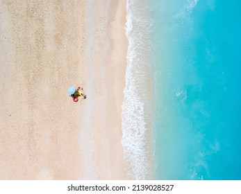 directly above view of egremni beach at Lefkada island, Greece copy space small cruise boat - Shutterstock ID 2139028527